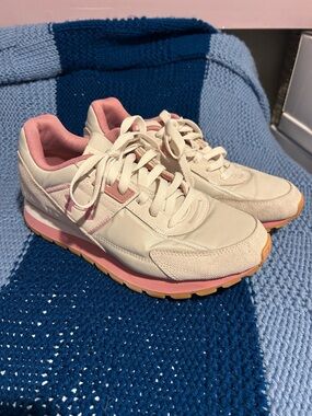 Under Armor, women’s size 8 1/2, good condition, pink/white/tan soles
